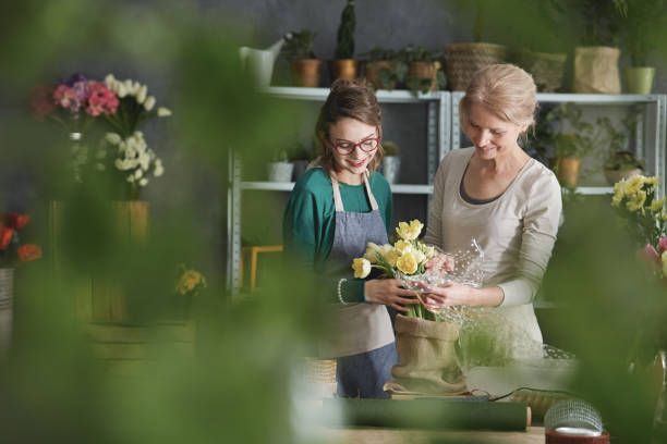 istock Florists making floral arrangement 820600464