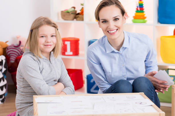 istock Special educator and child patient 820616208