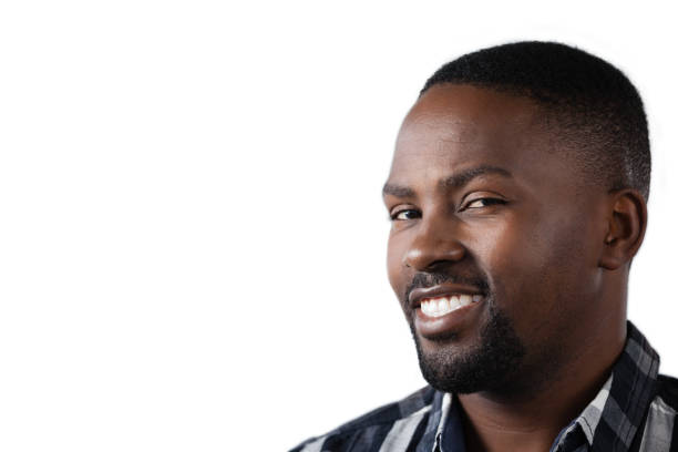 istock Happy man standing against white background 820634758