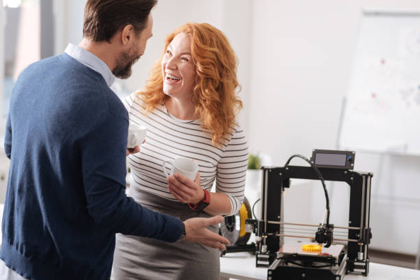 istock Positive happy colleagues laughing 820643182