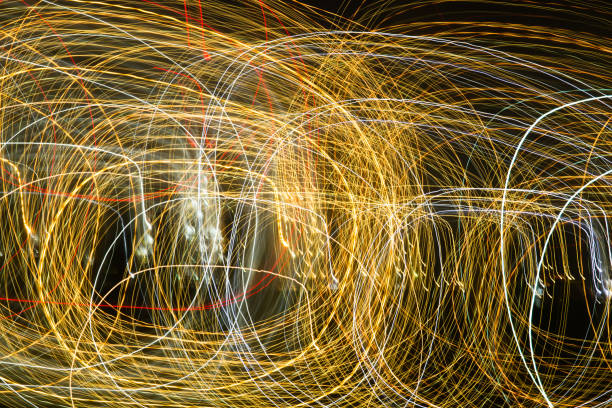 istock Abstract background of light bulbs at night in motion 820659888