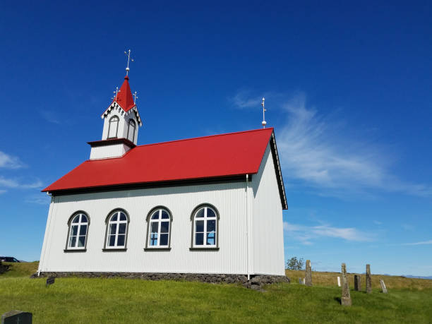 istock Single church in green field blue sky 820660032