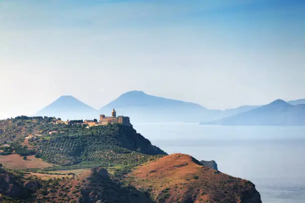The Sanctuary of Tindari in the foreground and the Aeolian Islands in the background. Province of Messina, eastern Sicily.