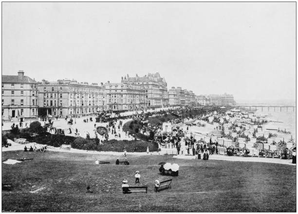 Antique photograph of seaside towns of Great Britain and Ireland: Eastbourne Antique photograph of seaside towns of Great Britain and Ireland: Eastbourne eastbourne pier photos stock illustrations