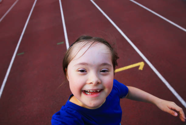 istock Little girl have fun on the stadium 820693694
