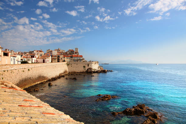 Seawall and harbor in Antibes France stock photo