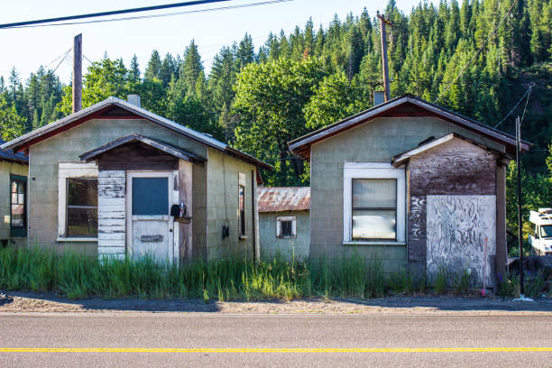istock Two Shanty Cabins In Mountains 820696798