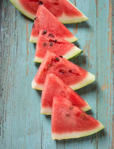Watermelon triange slices on grunge background