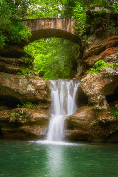 waterfall and bridge - cedar falls iowa fotografías e imágenes de stock