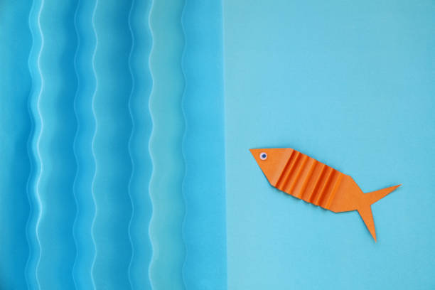istock Orange tropical fish of origami 820739246
