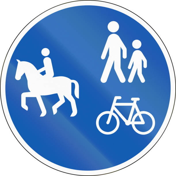 istock Road sign used in Denmark - Shared lane for equestrians, pedestrians and cyclists 820741448