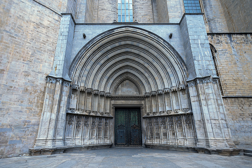 GIRONA, SPAIN - 29 JUNE 2017 - Gothic portal of St. Michael of The Girona Cathedral and place of shooting 6th season of Games of thrones. Girona, Spain.