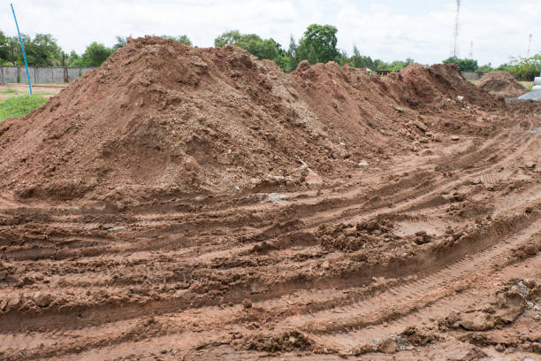 istock Dirty broken rural road with deep tire tracks. 820743222