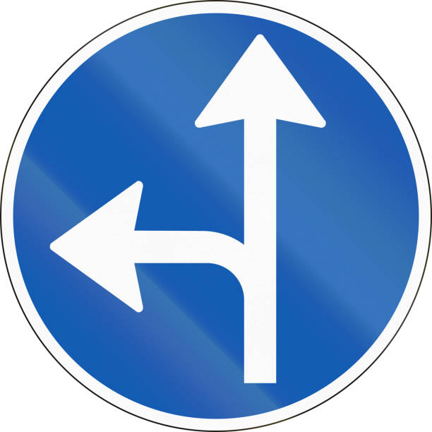 istock Road sign used in Denmark - Straight or left ahead 820743800