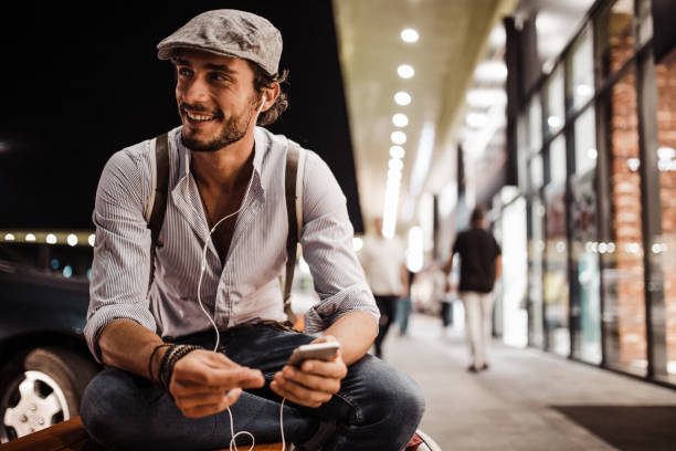 istock Cute man listening music 820746506