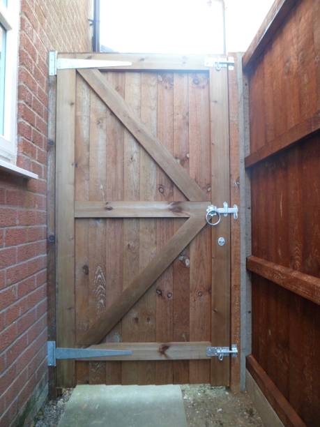 istock Traditional Wooden Garden Gate - Modern Construction 820749474