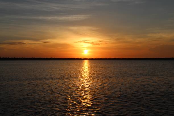 istock beautiful sunset over the lake 820750418
