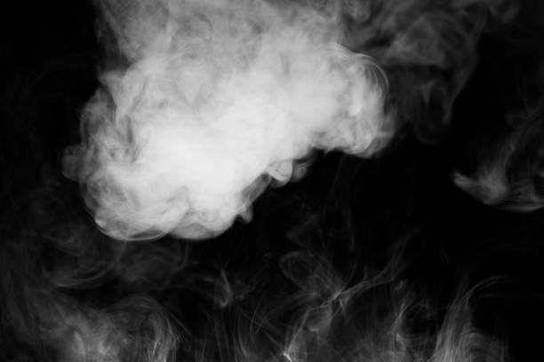 istock close up of steam smoke on black background 820758568
