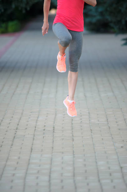 istock Young Woman Stretching Her Legs and preparing for a marathon 820758932