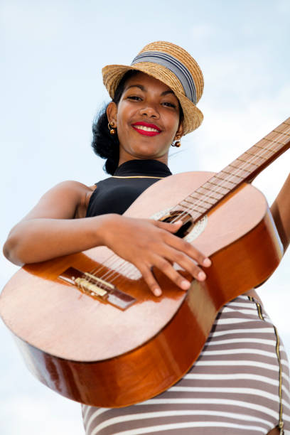 istock Cuban woman with guitar 820759544