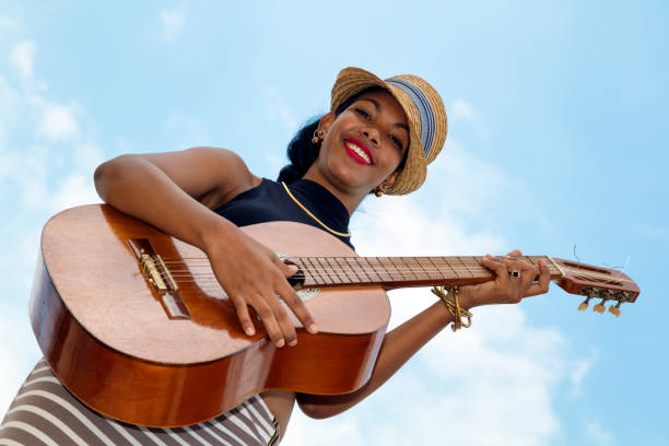 istock Cuban woman with guitar 820760798