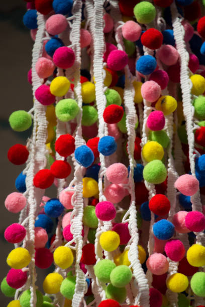 istock Set of colorful  pompoms in the bazaar 820765630