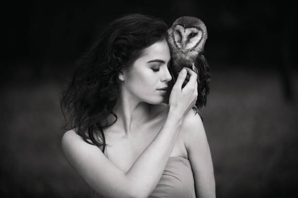 Beautiful woman with an owl.