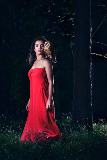 istock Beautiful woman with an owl. 820770474
