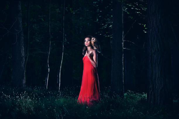 istock Beautiful woman with an owl. 820770476