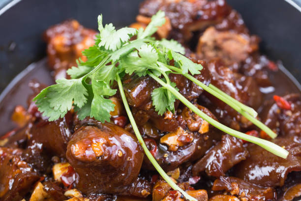 istock stewed cattle feet with chili pepper 820784688