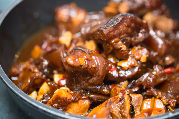 istock stewed cattle feet with chili pepper 820785792