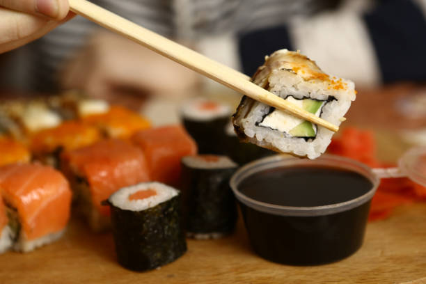 istock sushi roll california with soy souce 820788456