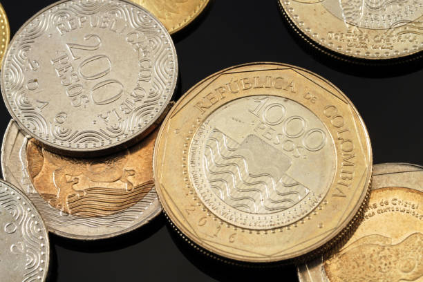 istock Colombian Coins In Macro On Black 820809044