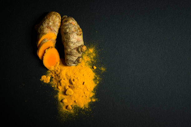 istock Turmeric roots and turmeric powder 820809352
