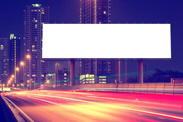 istock Blank billboard on light trails, street, urban in night 820812554