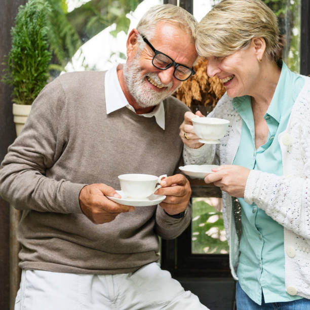 istock Senior Couple Afternoon Tea Drinking Relax Concept 820812706