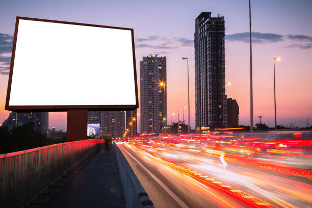 istock blank billboard on light trails, street and urban in twilight 820813134