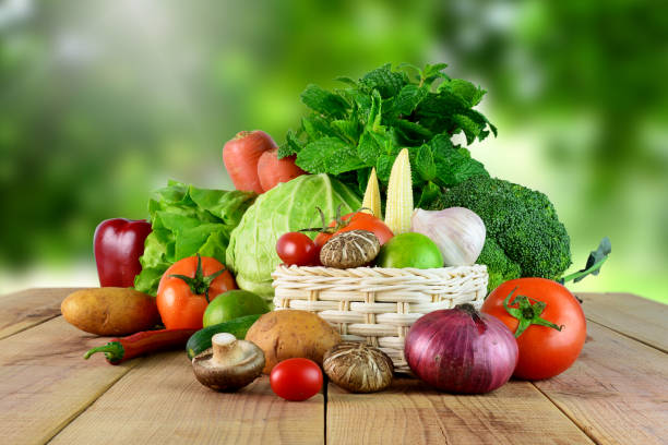 istock Fresh vegetables on wooden and blur background. 820813504