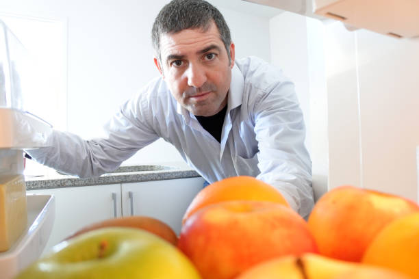 istock Man looking for food to eat 820813568