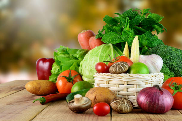 istock Fresh vegetables on wooden and blur background. 820813854