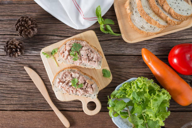 istock Preparing fresh homemade tuna sandwich with sesame bread. 820818362
