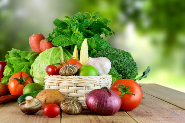 istock Fresh vegetables on wooden and blur background. 820818898
