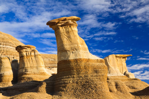Hoodoos in the badlands near Drumheller, Alberta, Canada Hoodoos, a geologic formation on a bright day in the badlands near Drumheller, Alberta, Canada drumheller stock pictures, royalty-free photos & images