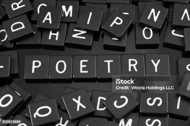Black Letter Tiles Spelling The Word Poetry Stock Photo - Download Image Now - Abstract, Arts Culture and Entertainment, Author