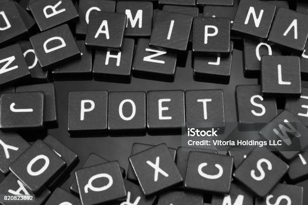 Black Letter Tiles Spelling The Word Poet Stock Photo - Download Image Now - Abstract, Arts Culture and Entertainment, Author