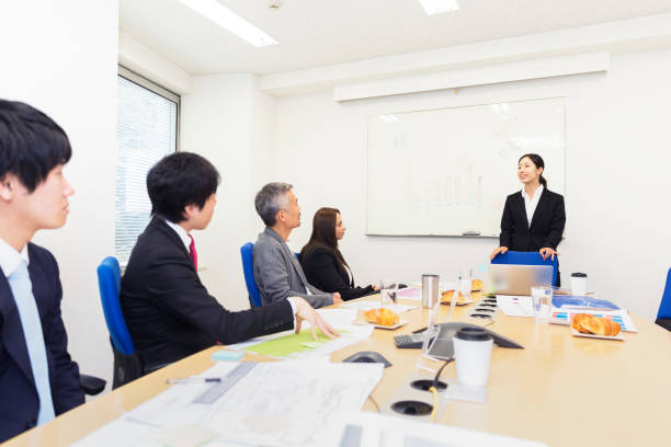 istock Junior business executive pitching an idea to her team 820825802