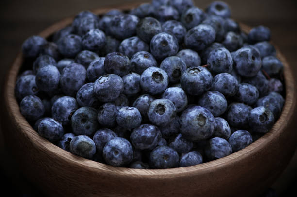 istock Blueberries in wood bowl 820832280
