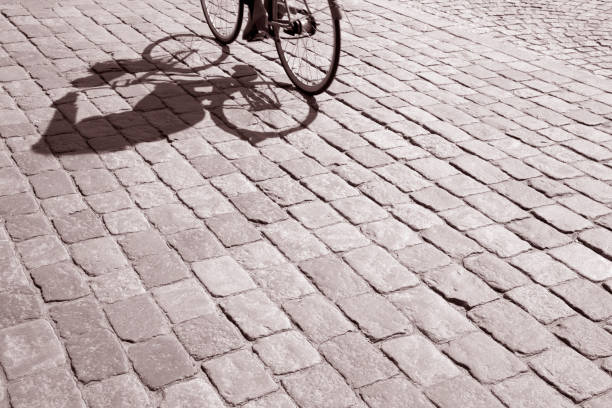 istock Cyclist on Cobblestones, Stockholm 820835802