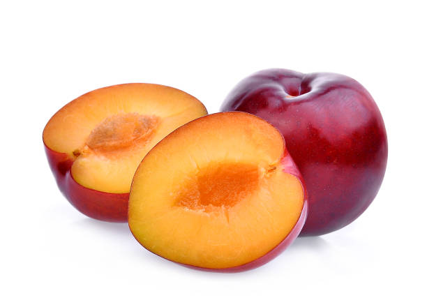 istock whole and half of red cherry plum isolated on white background 820841028