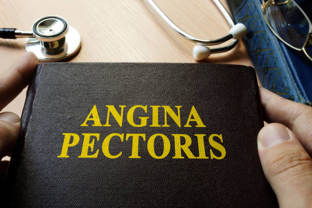 istock Title Angina pectoris on a book which holding doctor. 820846604